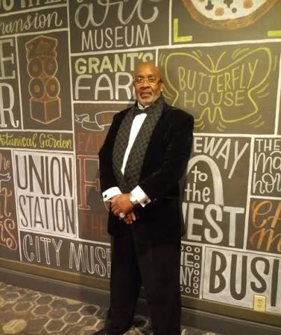 Terry Dumas, owner of Driver 1 Transportation, in a black tuxedo